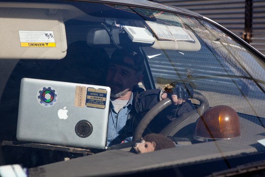 Maisel's mobile office, with a laptop stand he built himself.